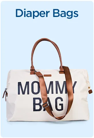 White diaper bag labeled 'Mommy Bag' with brown leather straps.